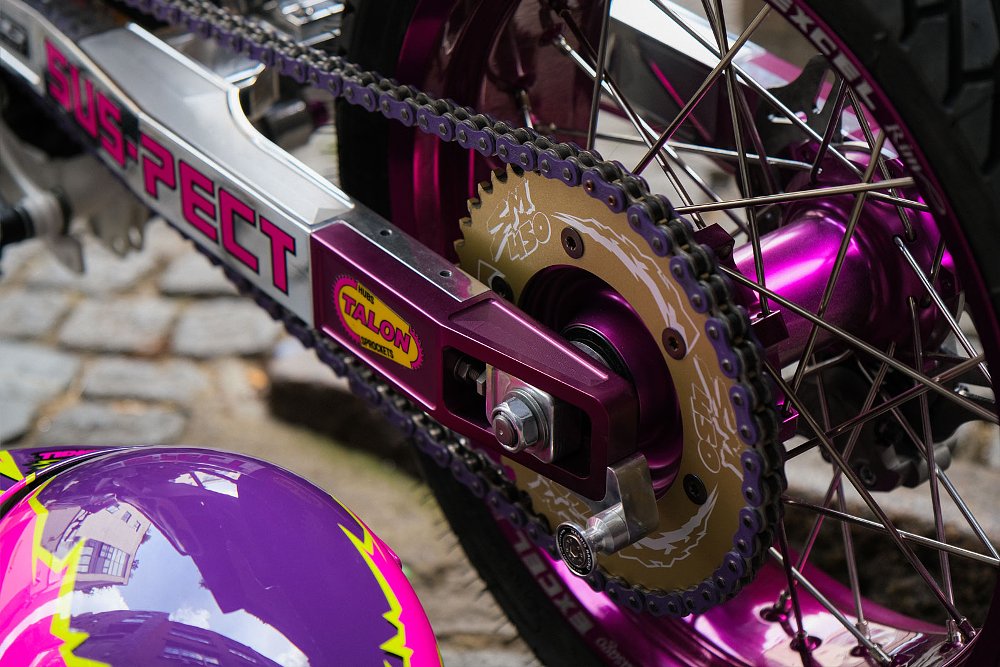 close view of rear wheel and swingarm