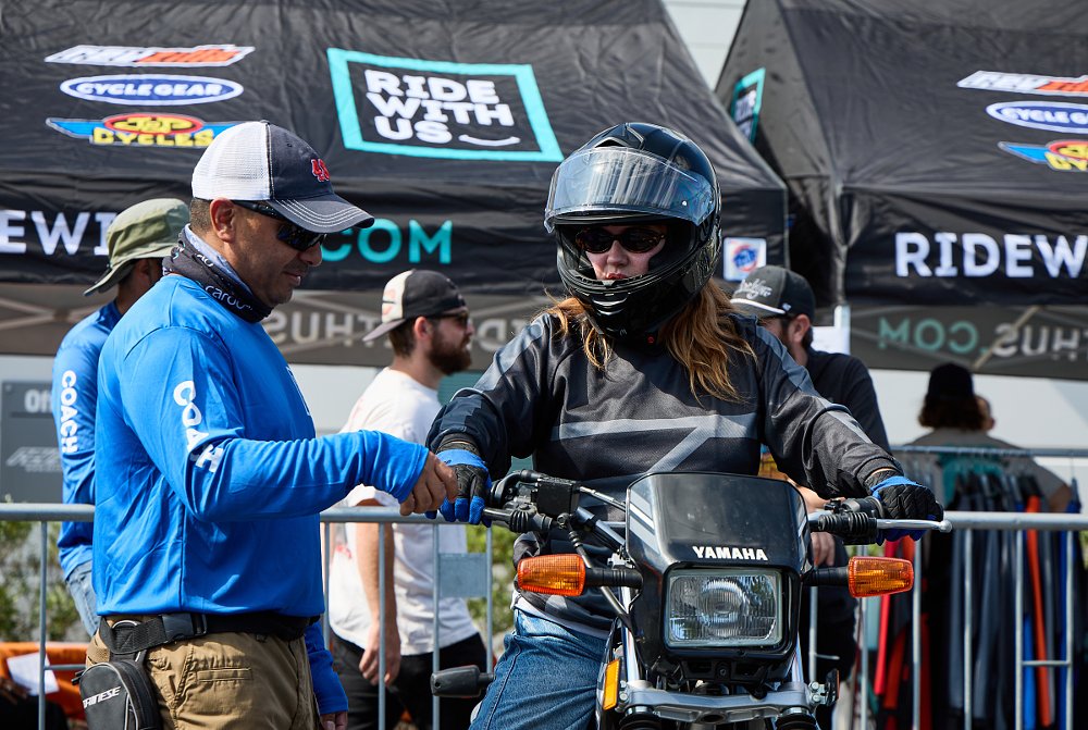 woman rider gets advice from an instructor