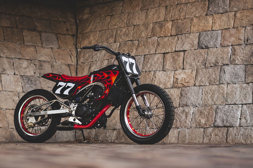 front view of the tracker with flames painted on it