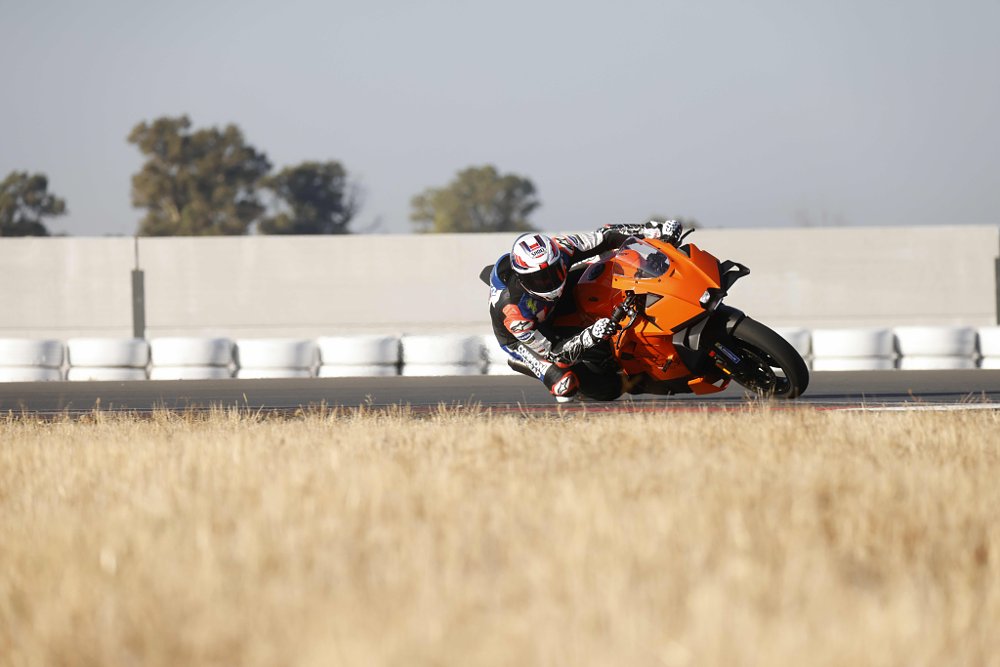 2026 KTM 990 RC R turning right through a curve at the Sevilla Circuit.
