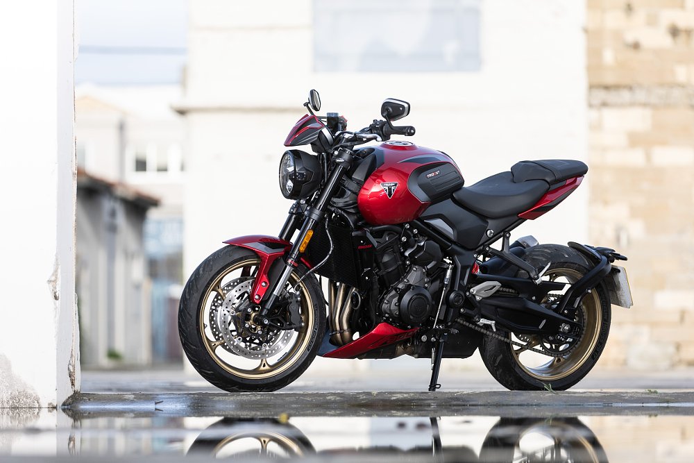 red Trident 800 parked on a street in an old area of the city in Cyprus