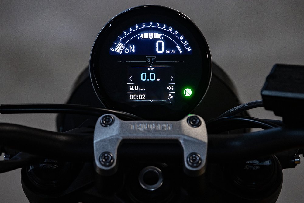 view from cockpit of round digital display