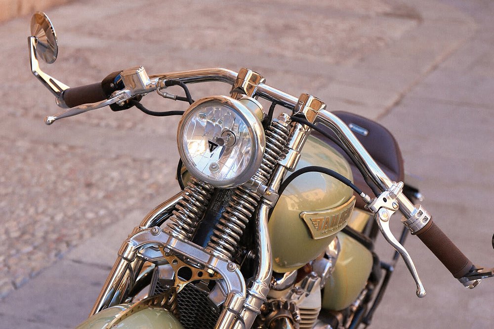 front view of the motorcycle showing the springer suspension