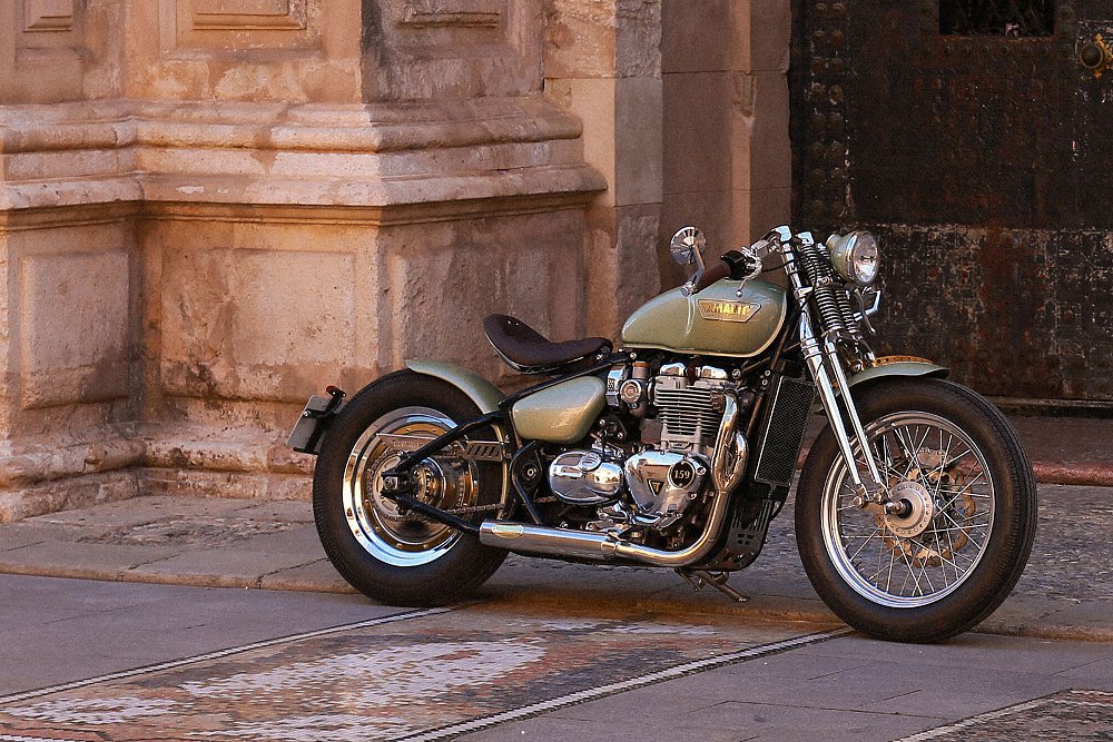 customized Triumph Bobber with pale green paint