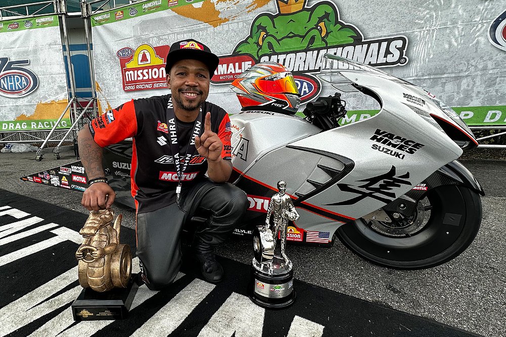 Richard Gadson poses with two trophies and his race-winning Hayabusa at the GatorNationals. 