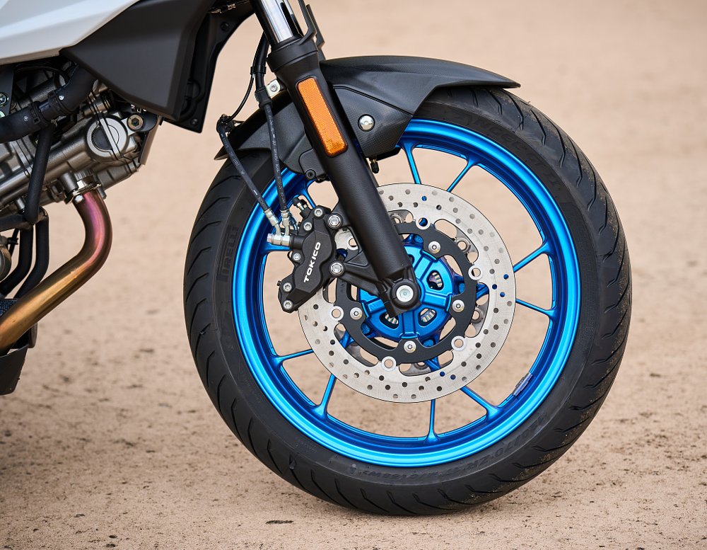 close view of front wheel, brakes, and fork