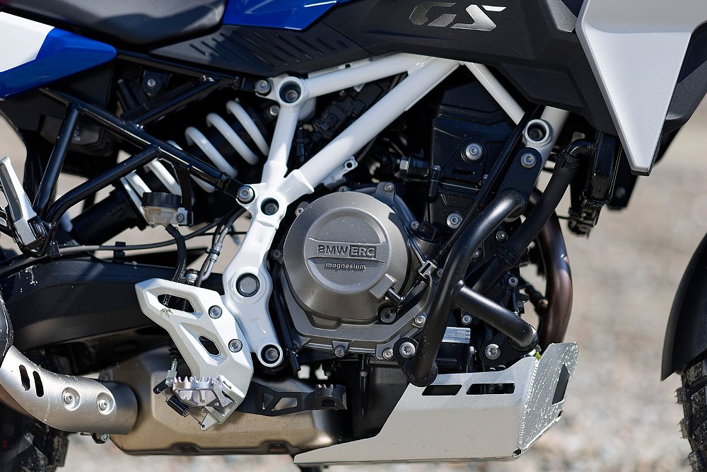 A close up of the ERC-branded case cover on the F 450 GS's parallel-twin engine.