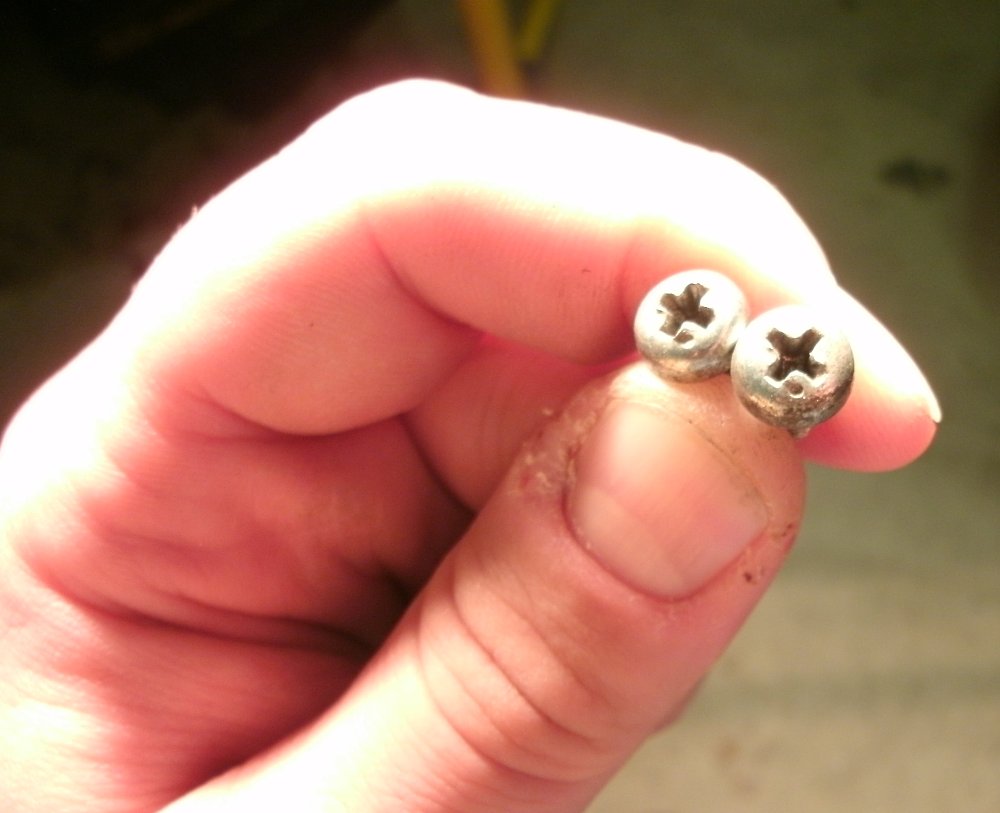 Dimples in the head of a fastener indicate the need for JIS tools
