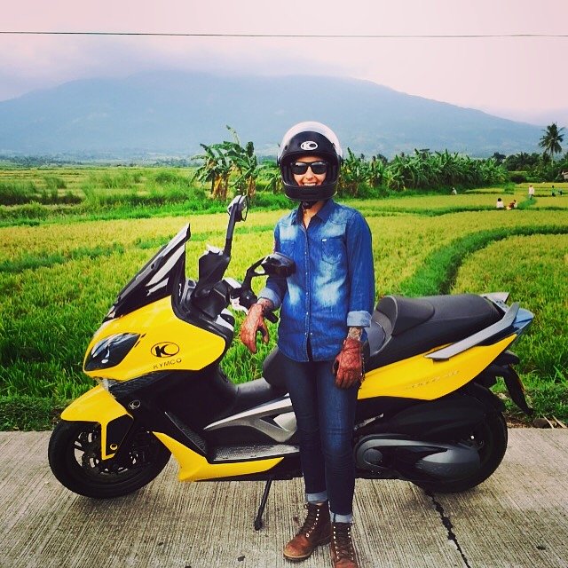 Jaime Dempsey and Kymco scooter in the Philippines
