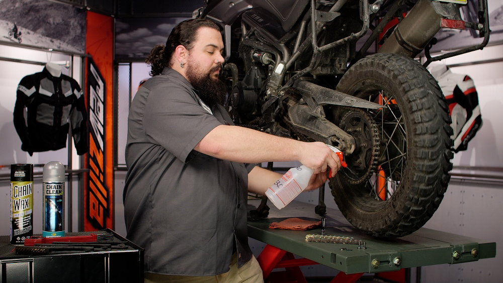 Spraying Motorcycle Chain Cleaner