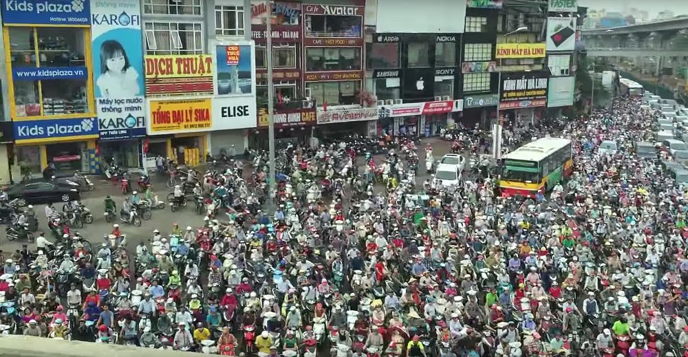 Motorcyclists and traffic in Hanoi, Vietnam