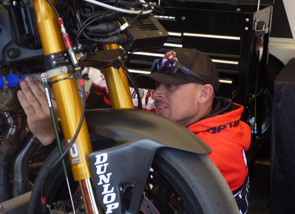 Gary Dean works on radiator problem