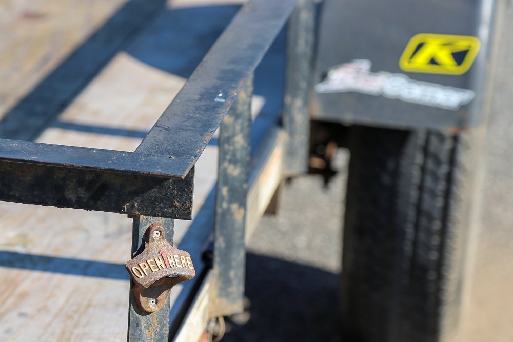 Trailer bottle opener
