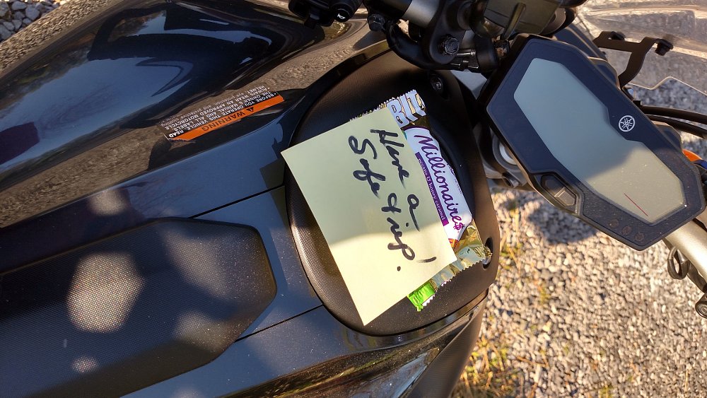 gift chocolate bar on the motorcycle gas tank
