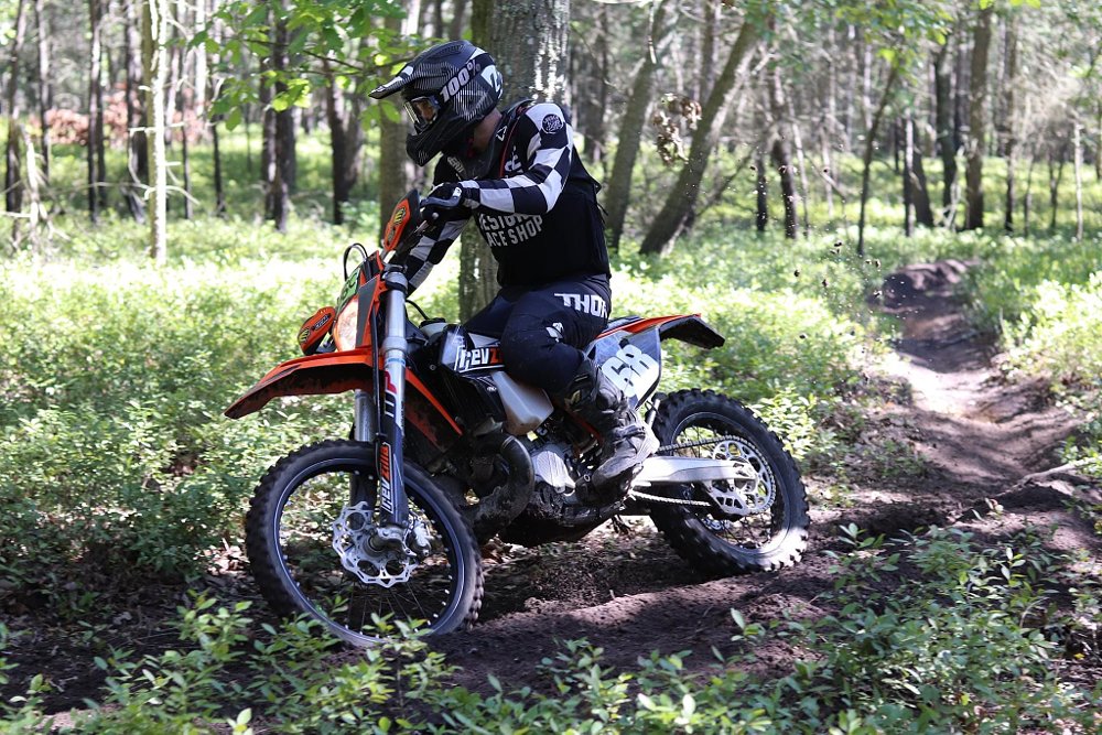 Rider on trails during enduro