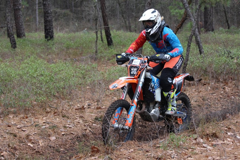 Dirt bike rider competing in enduro.