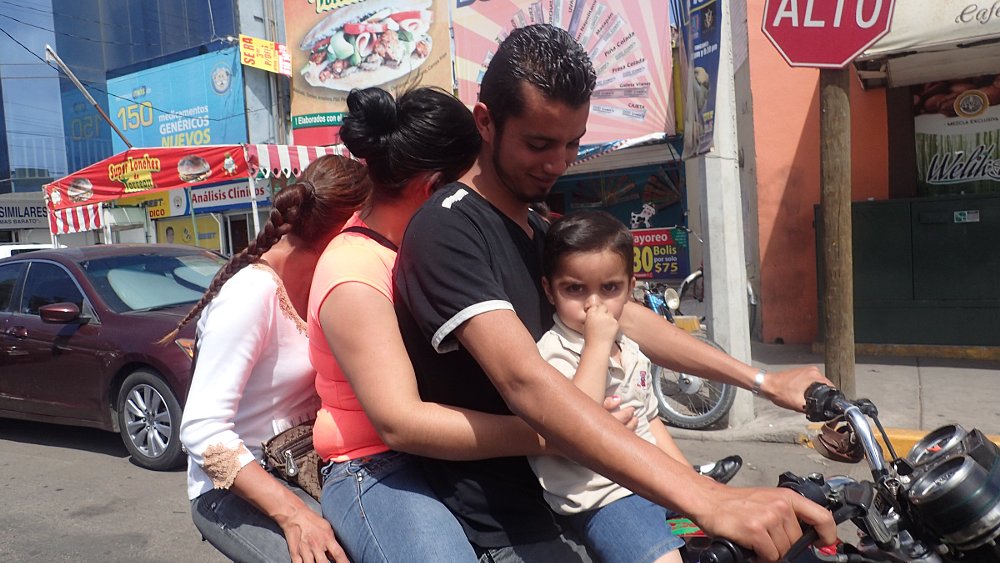 family on a scooter