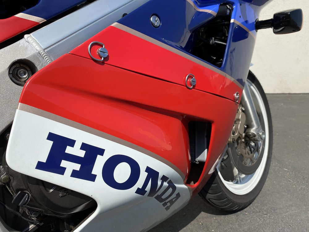 Detail of a Honda RC30 fairing and fastners.