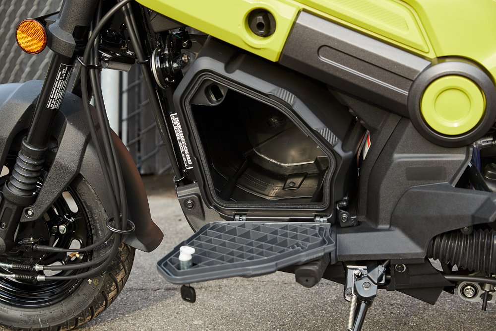 Honda Navi storage box interior detail