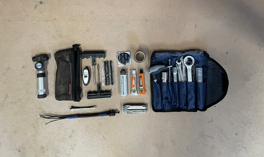 A top down view of the repair kit and tools.