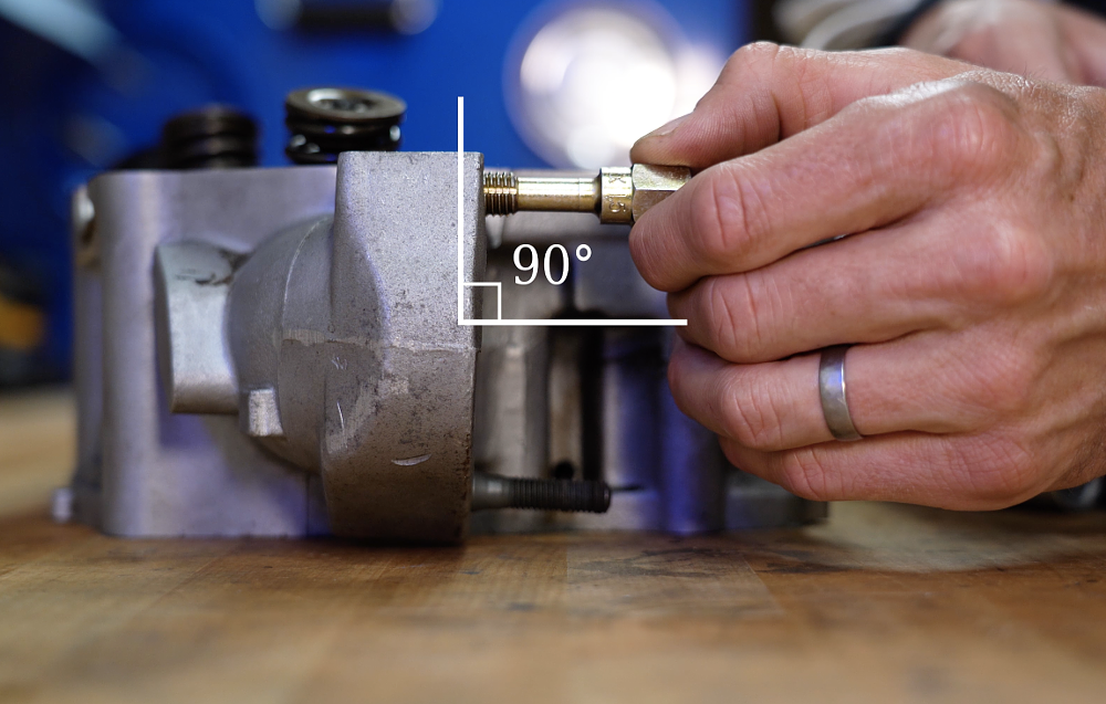 Keeping your tool aligned is important when repairing damaged threads.
