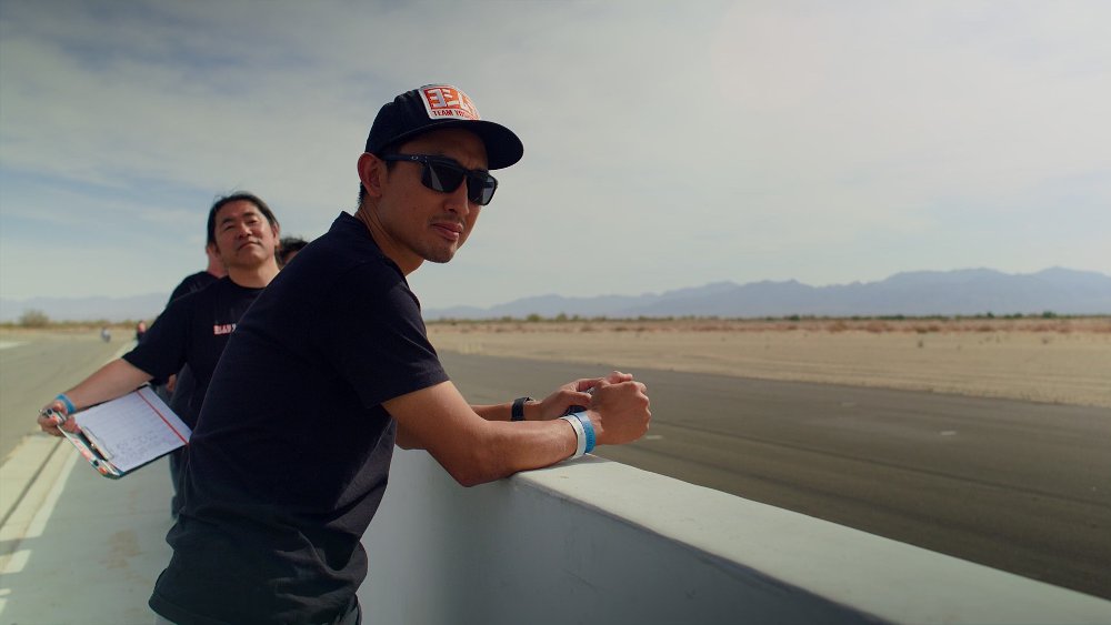 Yusaku Yoshimura watching Ari ride at Chuckwalla.