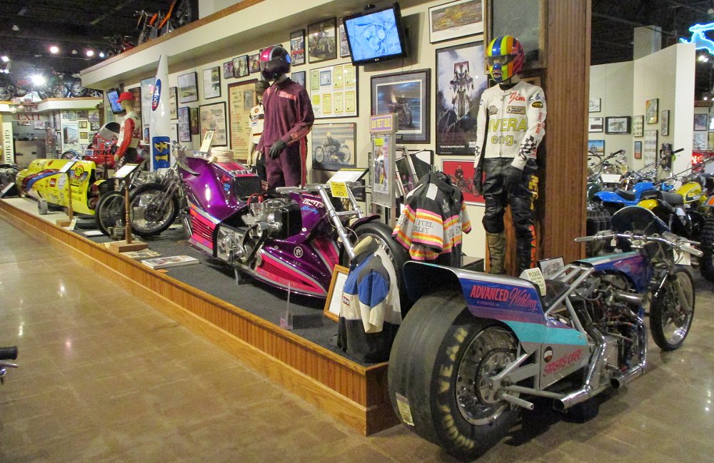 display of drag racing motorcycles and memorabilia