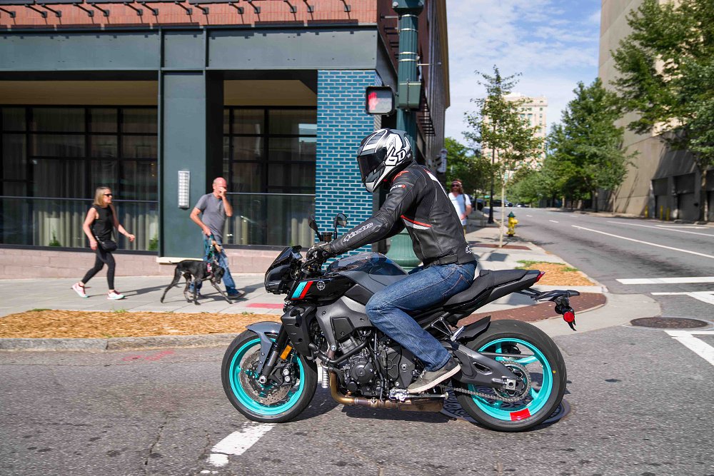 2022 Yamaha MT-10 left side with rider on a city street