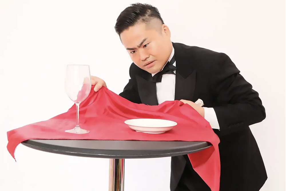 Mr. Eukusa tablecloth trick. 