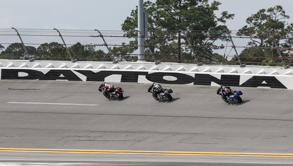 Bagger race motorcycles on the high banks at Daytona International Speedway