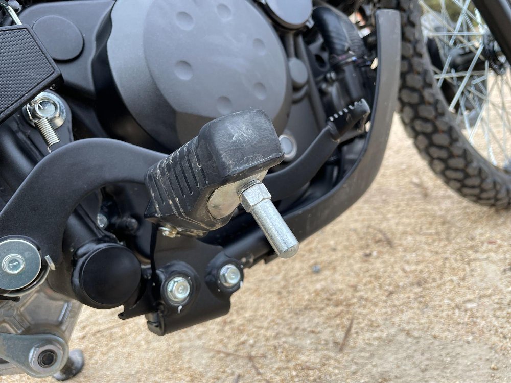 a close up view of the KLR650 footpeg
