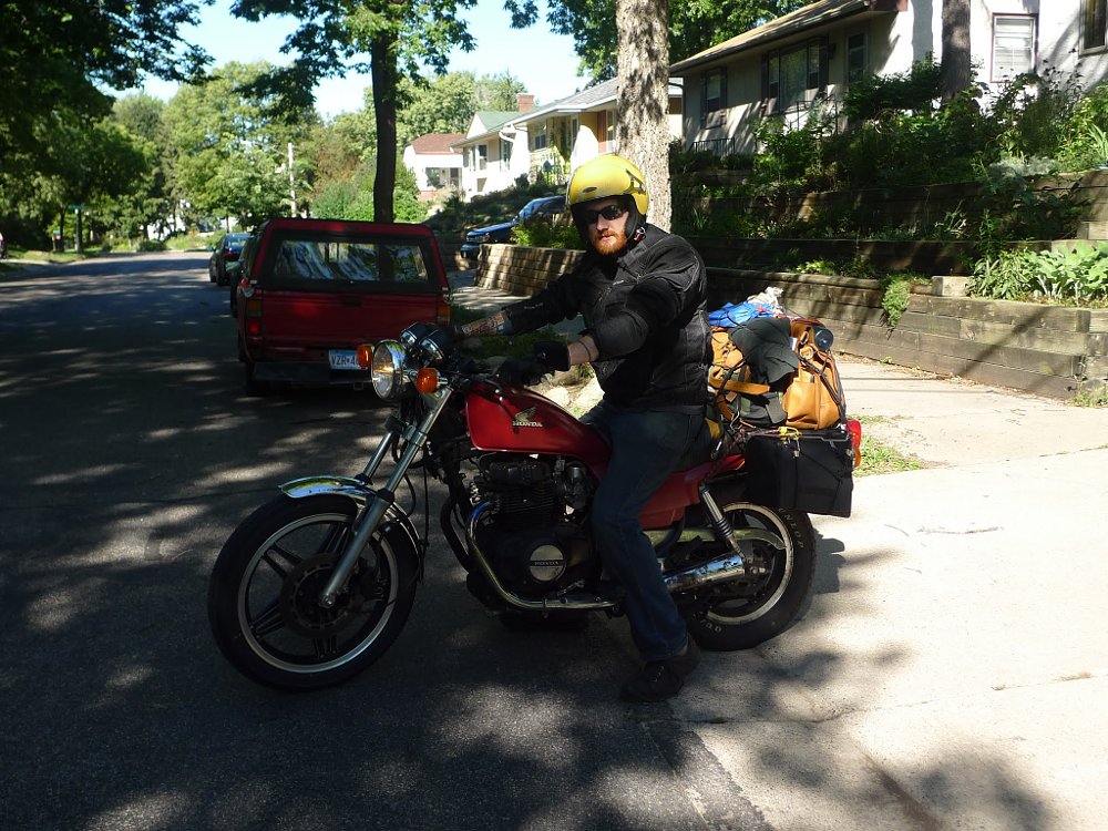 the writer on a heavily loaded Honda CB450, ready to leave for California