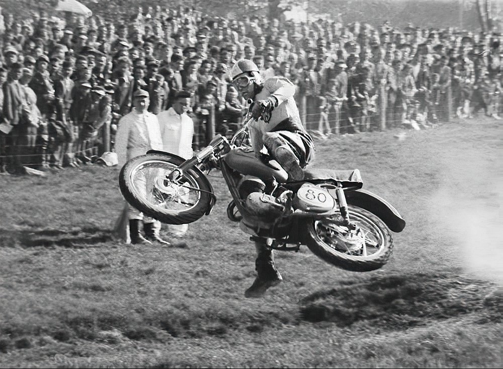 black and white photo of motocross rider