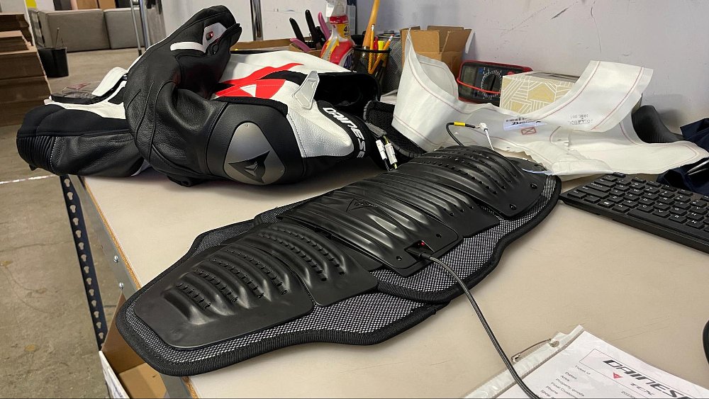 Photo of Dainese back protector plugged into a computer