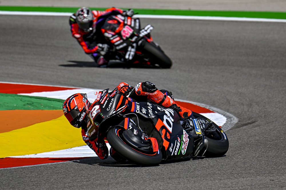 Maverick Vinales and Aleix Espargaro on track during testing