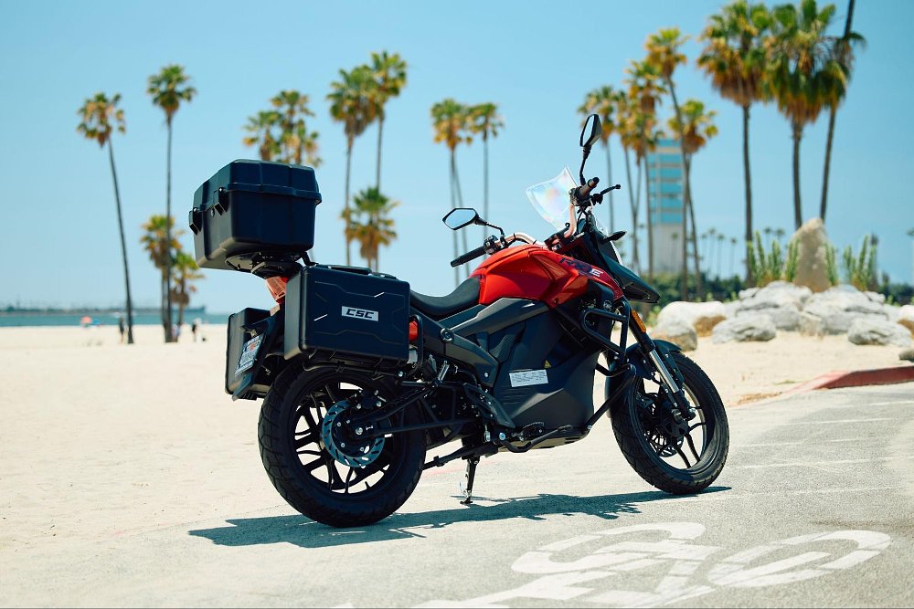 a rear three qarter view of the RX1E motorcycle parked at the beach