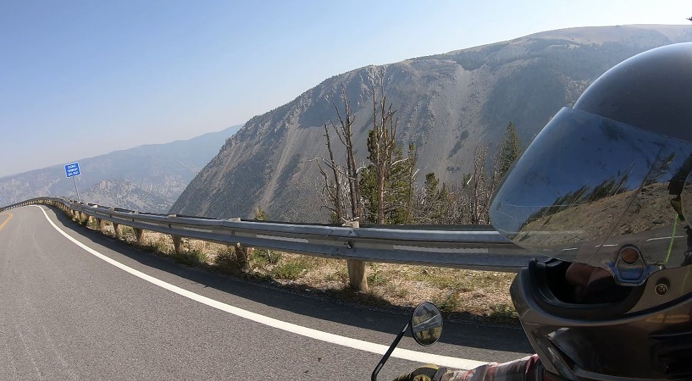 view of the mountain road from the rider's perspective