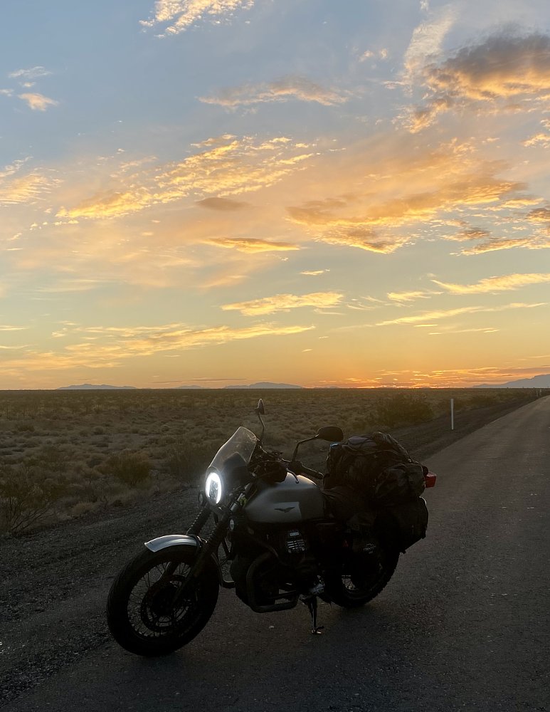 motorcycle on the road at sunrise