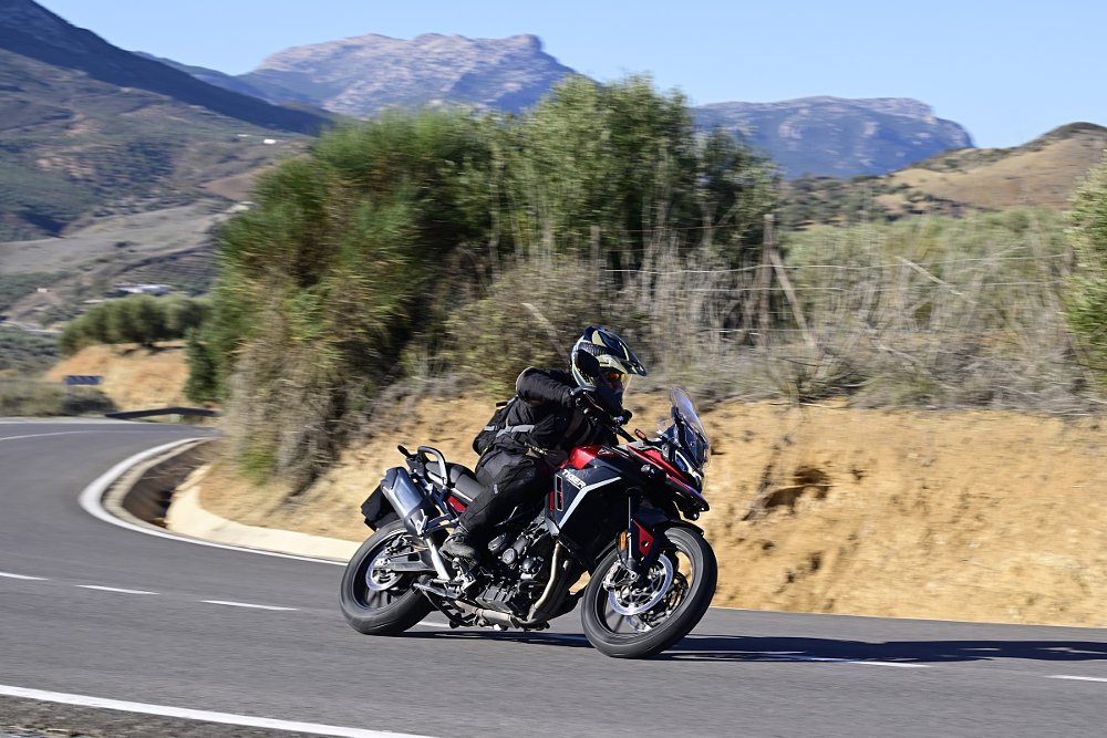 riding the Triumph Tiger 900 GT Pro on the road in Spain