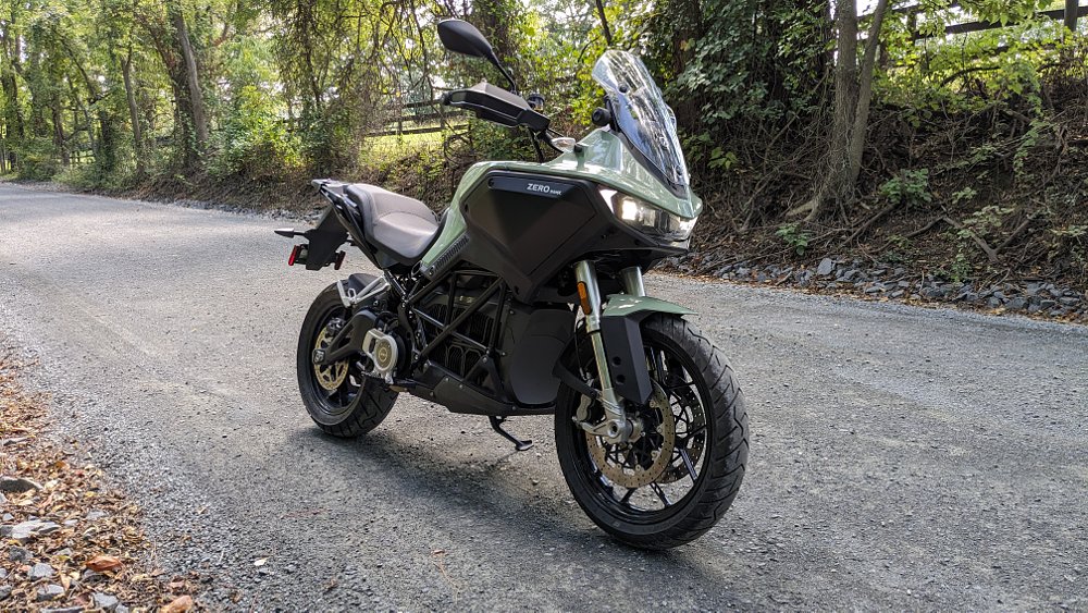Zero DSR/X parked along a dirt road in the forest