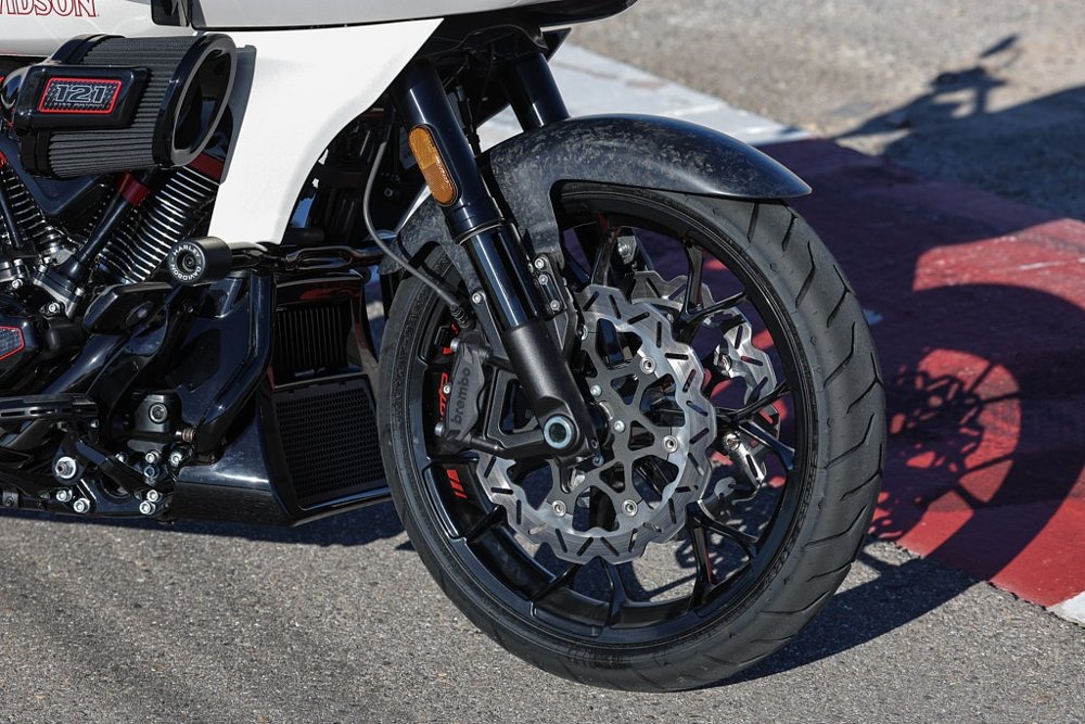 close up of 2024 Harley-Davidson CVO Road Glide ST front wheel and brakes