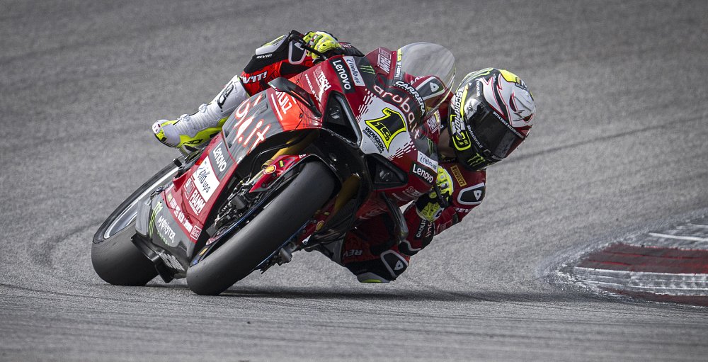Alvaro Bautista riding his Ducati Panigale with the number one plate