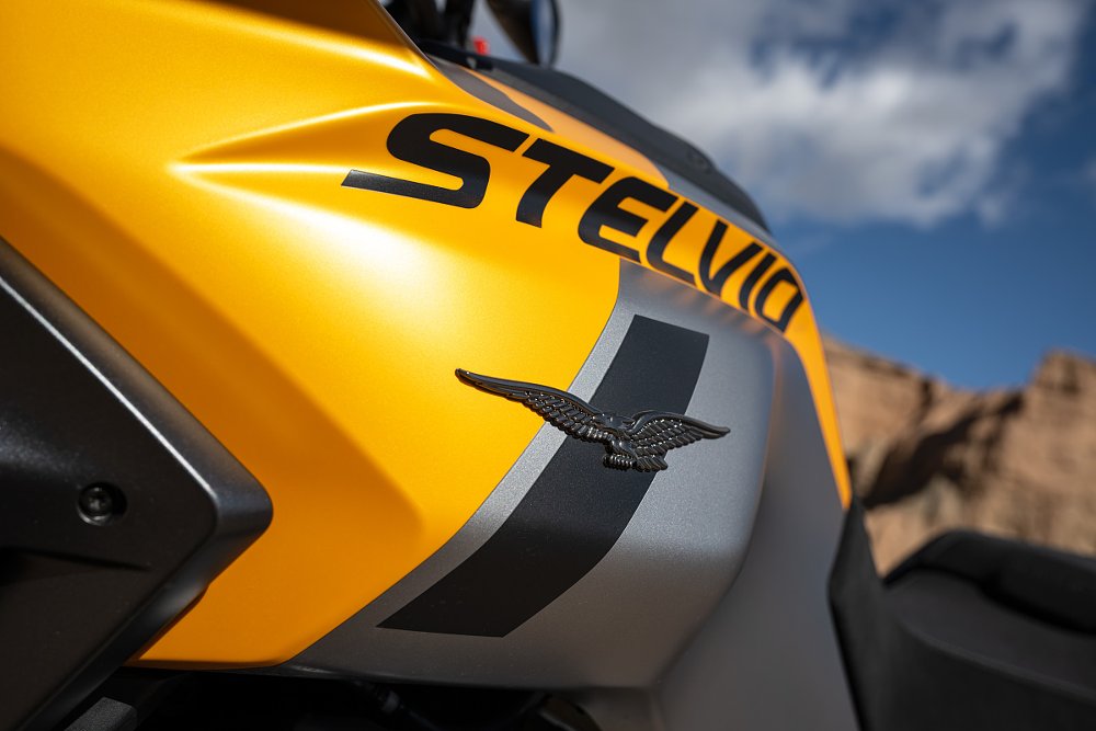 logo on yellow gas tank