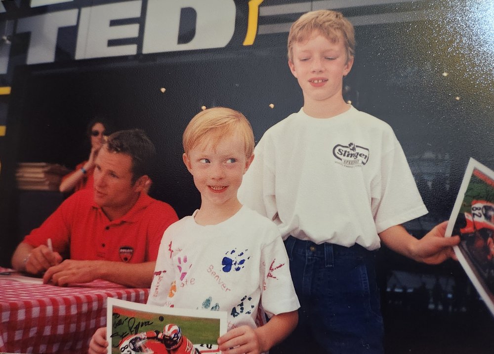 the boys with signed posters from Steve Rapp, who is signing more autographs in the background