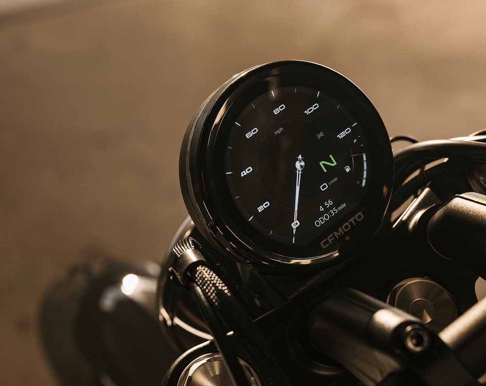round digital instrument display on the CFMOTO 450CL-C