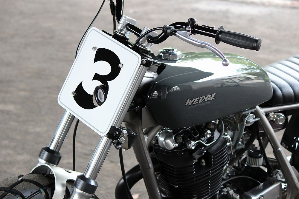 view of number plate on the front of the street tracker