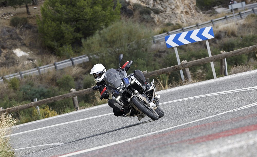 riding the GS Adventure through a curve on a country road in Spain