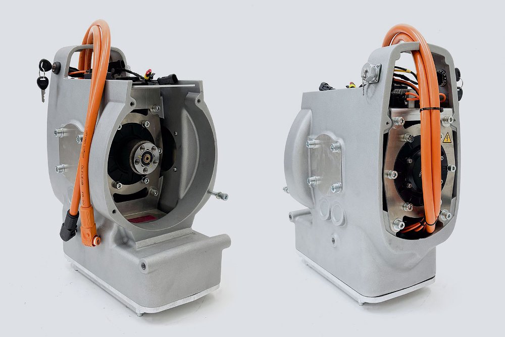 original engine cases open to show electric motor inside