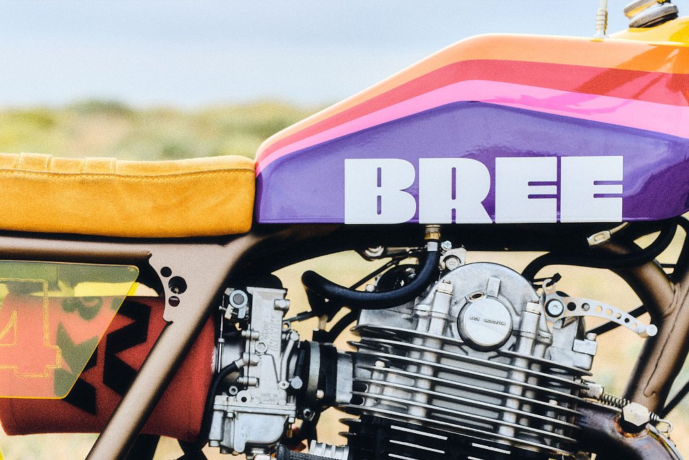 close up of engine and tank with multi-color paint