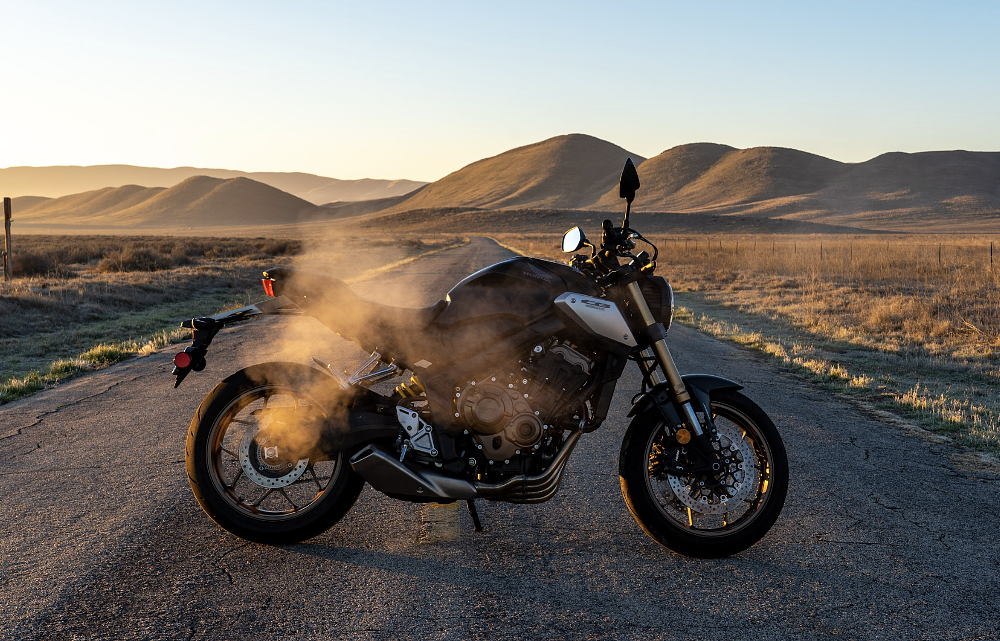 Idling motorcycle with exhaust steam